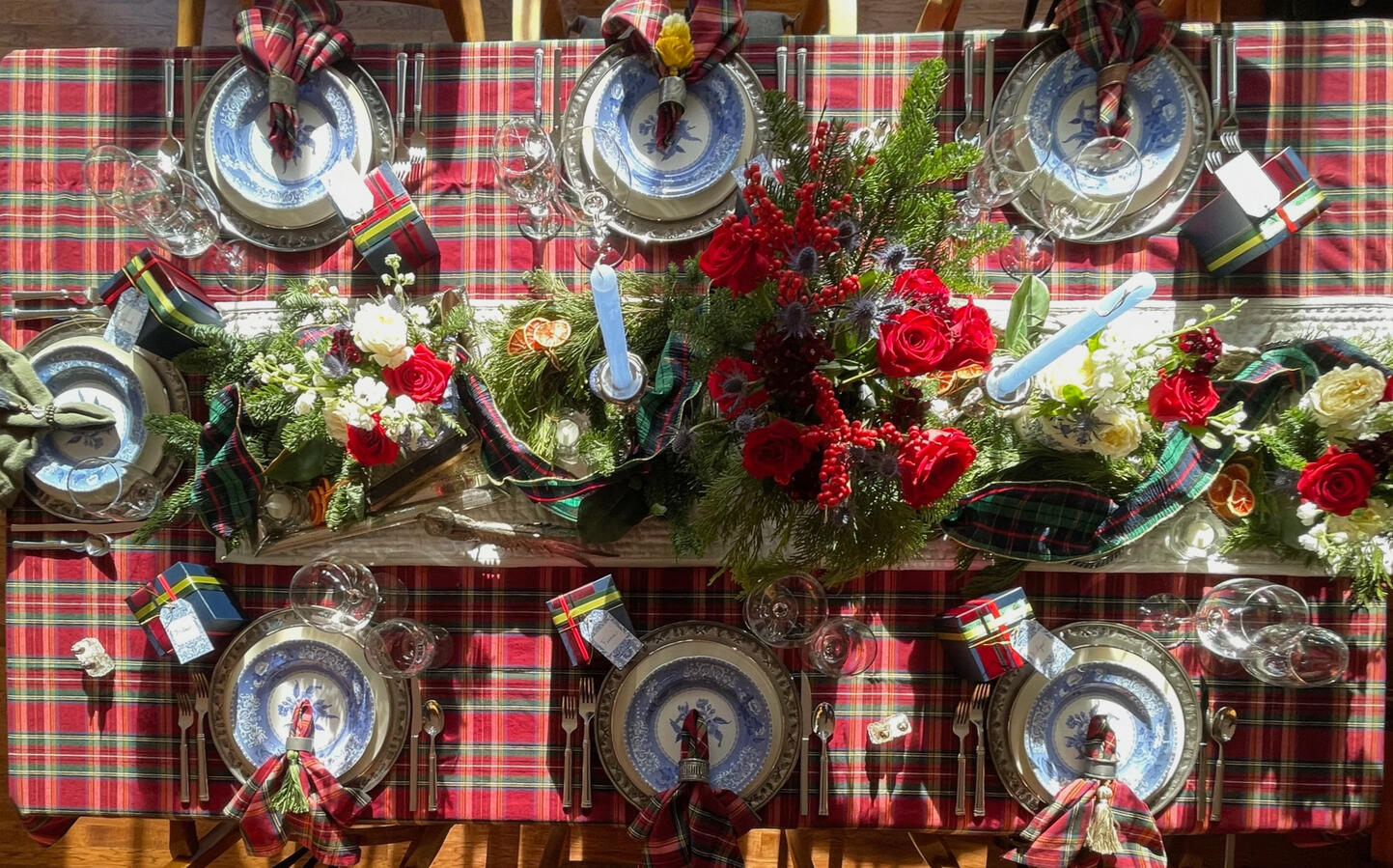 Spode Camilla Blue earthenware paired with vintage pewter chargers and traditional tartan creates a table rooted in classic holiday style. Layered, textural, and quietly rich, it reflects the enduring language of winter gatherings.